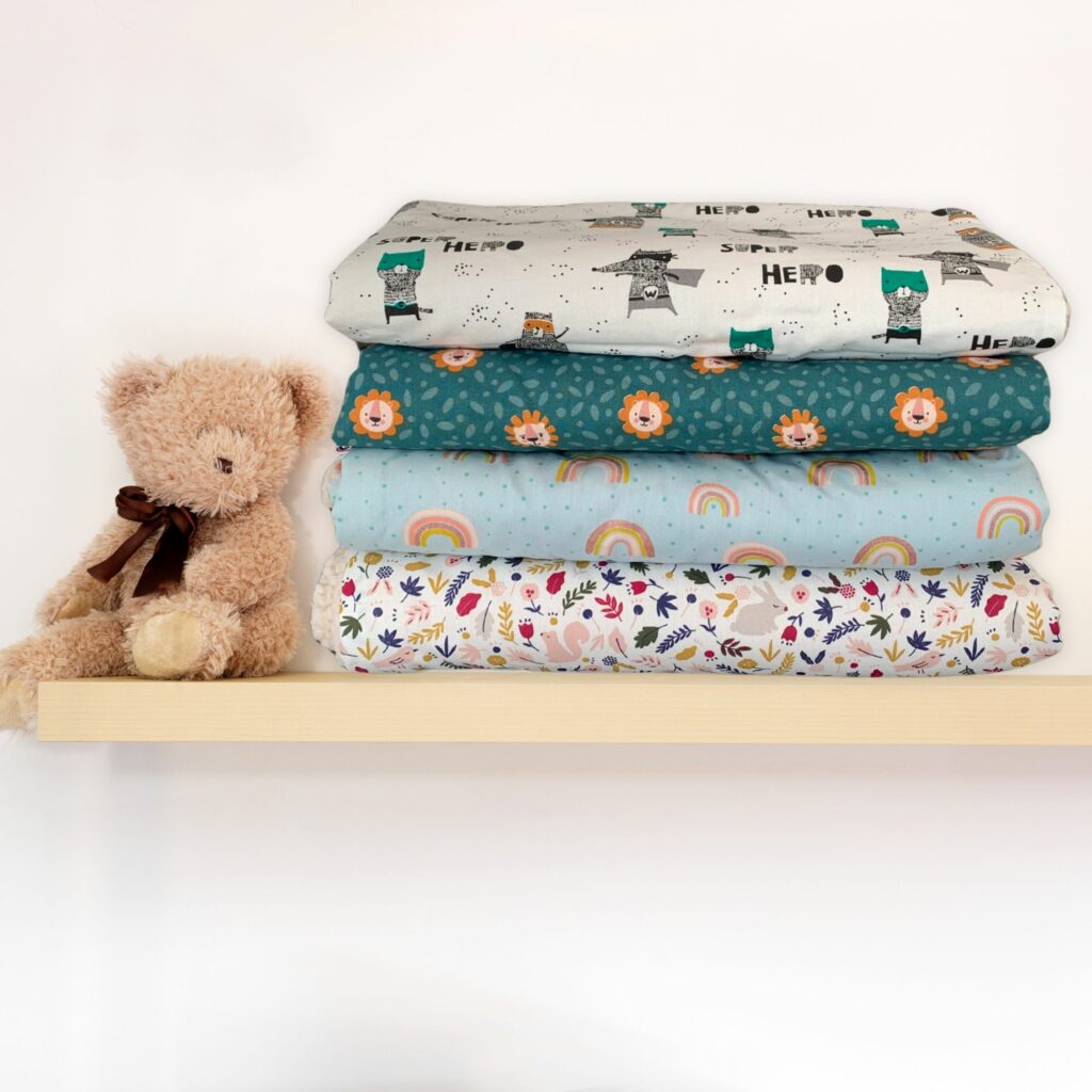 Couvertures en sherpa avec ours en peluche.