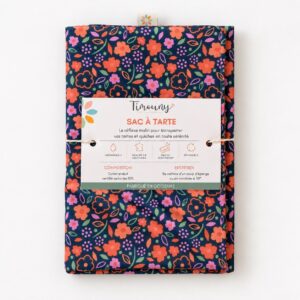 Sacs à tarte en tissu : imperméables et fabriqués en France 6 Sac à tarte Timouny plié avec son bandeau, motif floral sur fond bleu marine